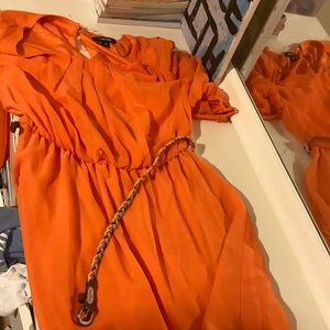 a coral colored dress